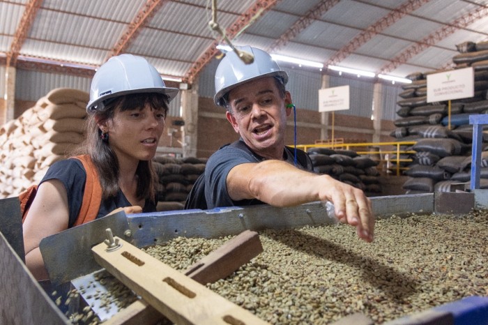 Participants of the Oikocredit Investor Journey touring the coffee processing plant of Oikocredit partner Finca Churupampa artile 3